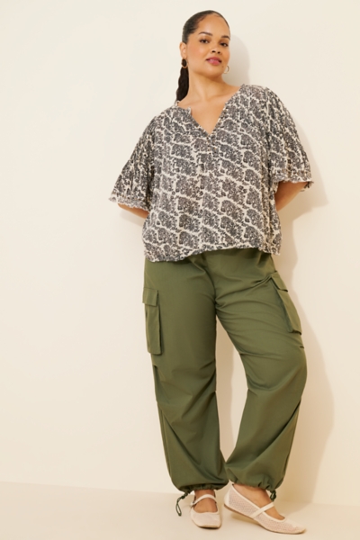 Pintuck Short-Sleeve Swing Top | Nuuly