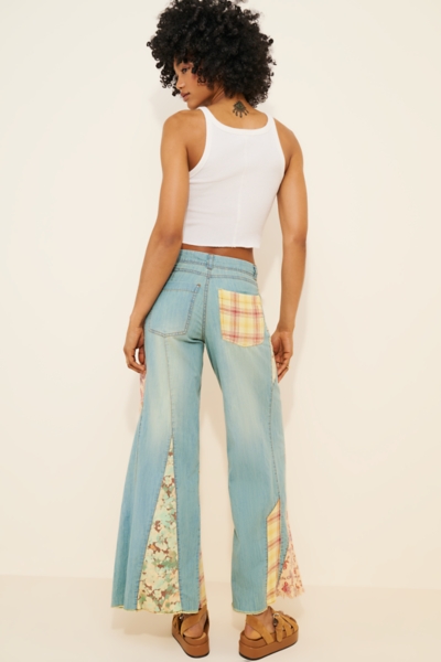 The Adi Mid-Rise Relaxed Flare Jeans: Patchwork Ed | Nuuly