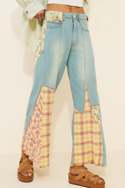The Adi Mid-Rise Relaxed Flare Jeans: Patchwork Ed | Nuuly
