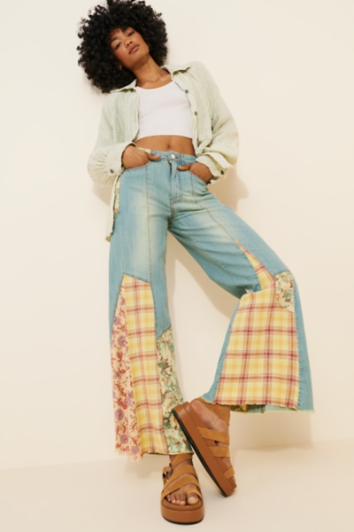 The Adi Mid-Rise Relaxed Flare Jeans: Patchwork Ed | Nuuly