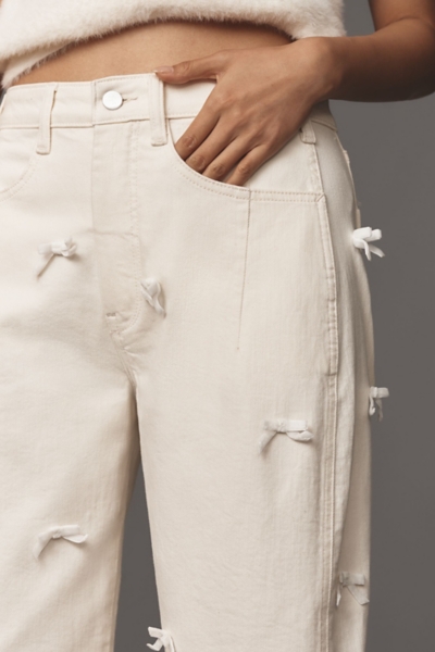 Heritage Curve High-Rise Tapered Jeans: Bow Editio | Nuuly