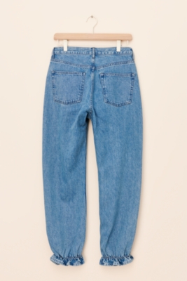 Flora Ruffled Hem Jeans | Nuuly
