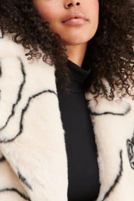 Katie Abstract Faces Coat | Nuuly