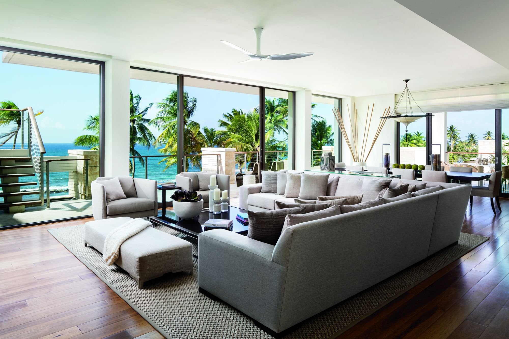Wood floors, gracious furnishings and ocean views in the Four Bedroom Penthouse living room