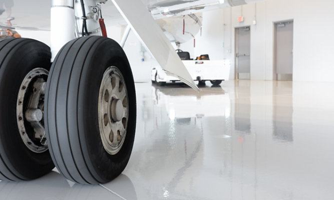 aircraft-tire-on-light-gray-hangar-flooring