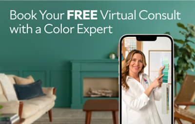 A phone showing a virtual color consultation with a woman holding up a fan deck and text saying book your free virtual color consult with a color expert.