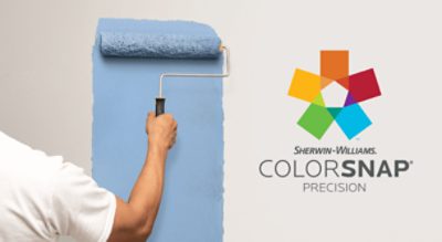 Sherwin-Williams ColorSnap Precision. A person rolling blue paint on a wall.