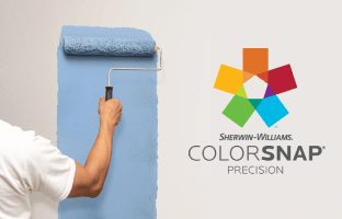 Sherwin-Williams ColorSnap Precision. A person rolling blue paint on a wall.