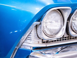 Headlight of a blue car
