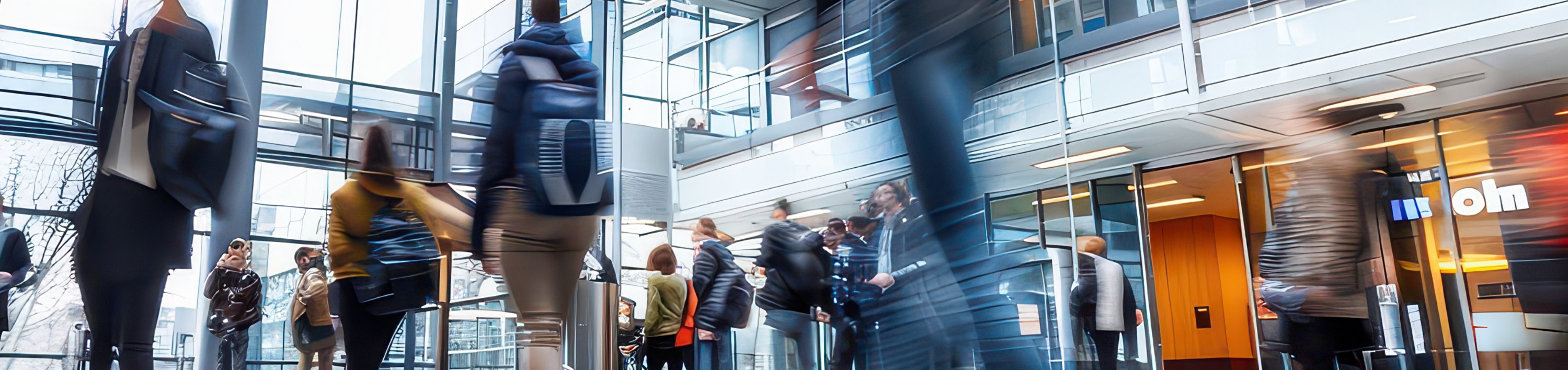 people walking through a building