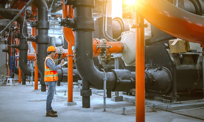manager-inspecting-facility-coatings