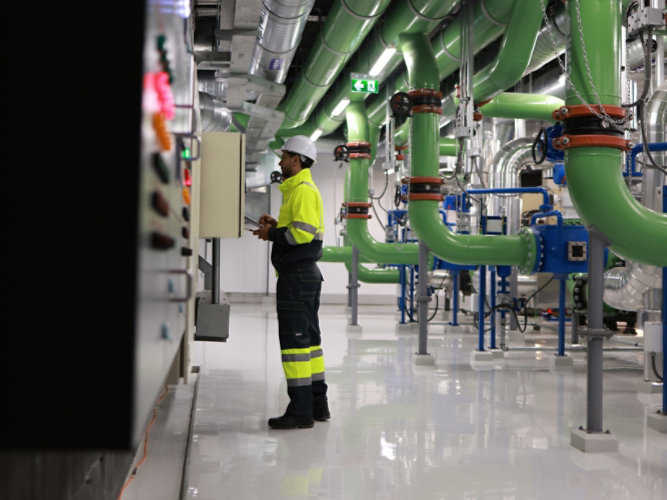 working looking at pipes