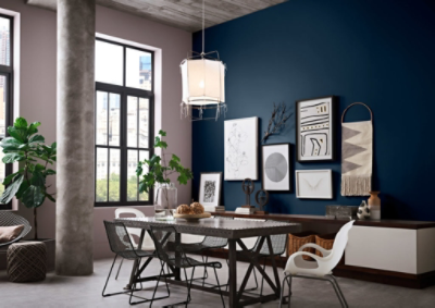 Modern office with Sherwin Williams 2020 Color of the Year Naval SW 6244 colored walls and abstract wall art. 