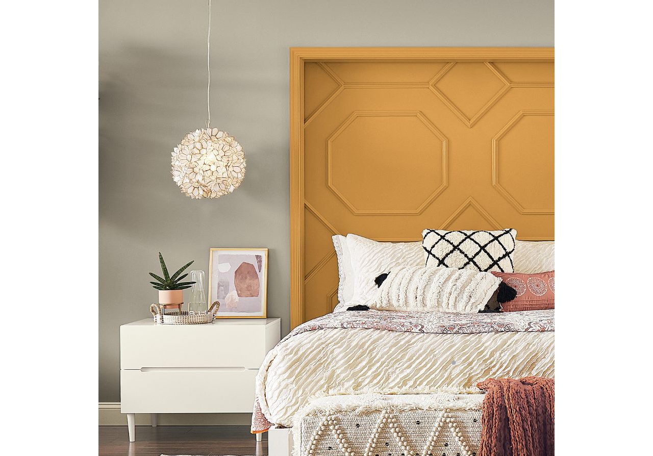 An open beige living room with a couch and chairs. S-W colors featured: sw 9086 Cool Beige.
