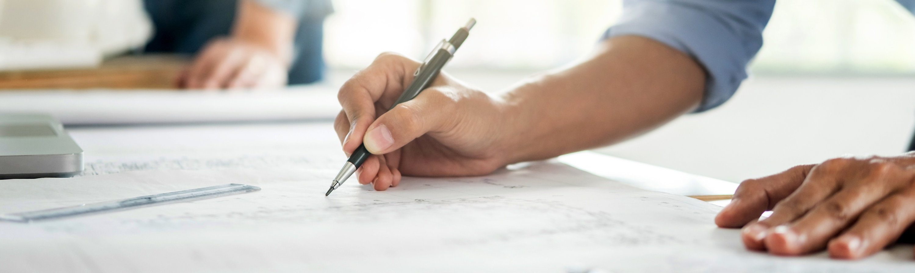 person reviwing drawings