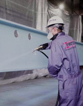 Spraying M90/03 onto a steel beam