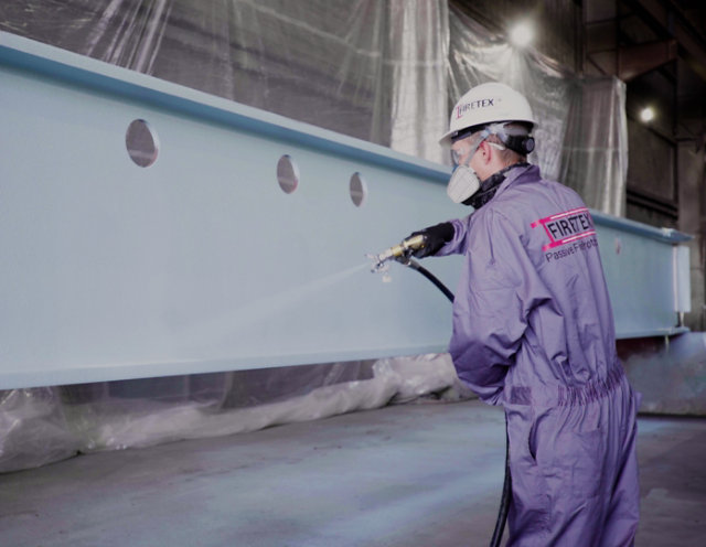 Applicator applying coating on a beam 