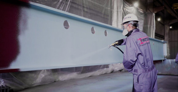 Coating being applied on beam 