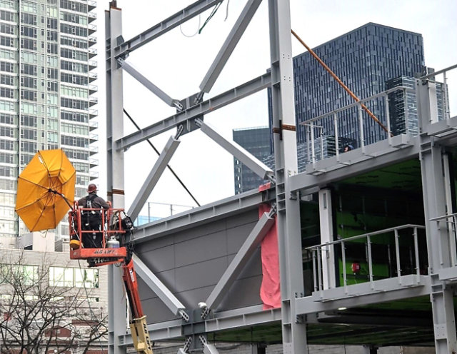 A building being constructed using steel beams.