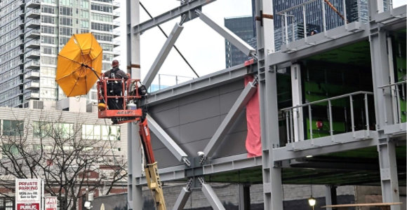 A building being constructed using steel beams