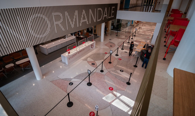 overhead view of college student center welcome desk