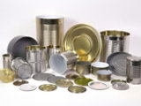 various metal food cans and ends arranged for display