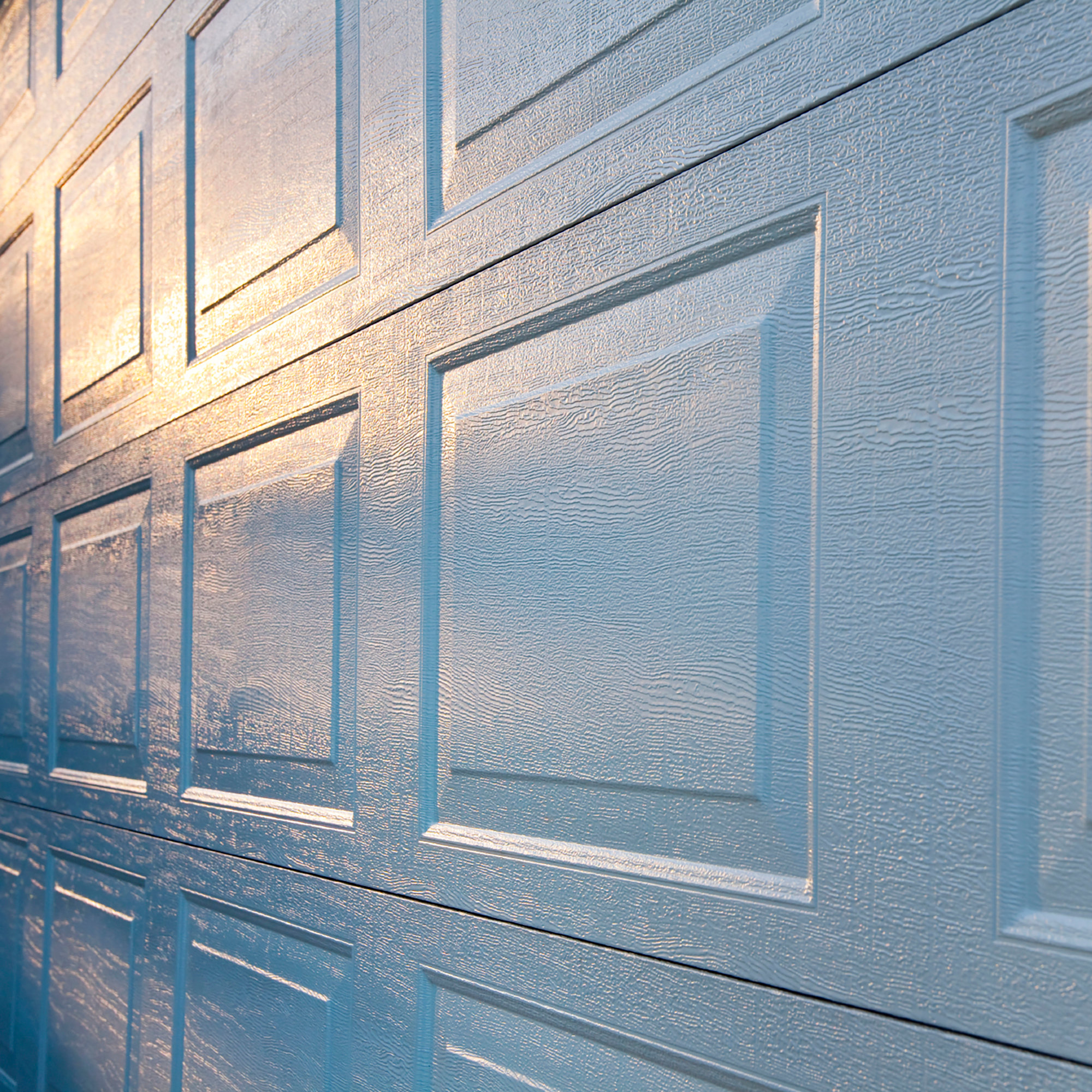 Close up of light blue garage door