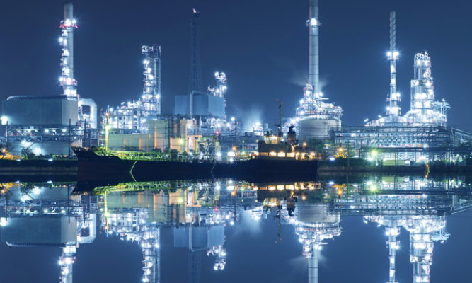 an oil refinery at night