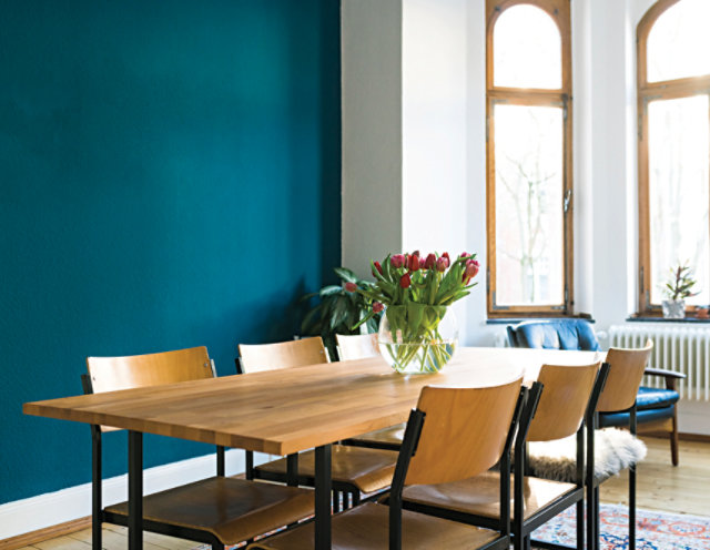 table with teal wall 