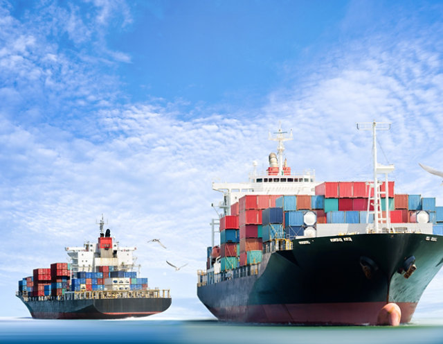 Cargo ships at sea.