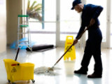 person mopping floor