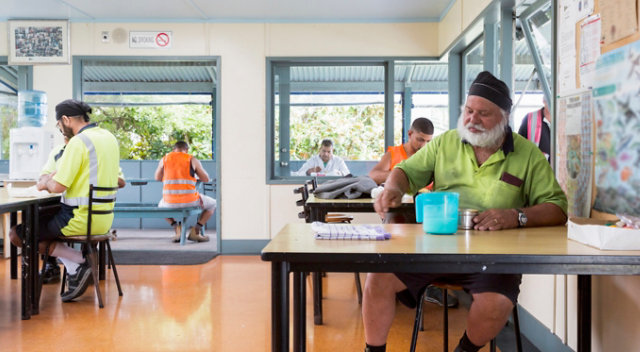 plant workers in lunchroom