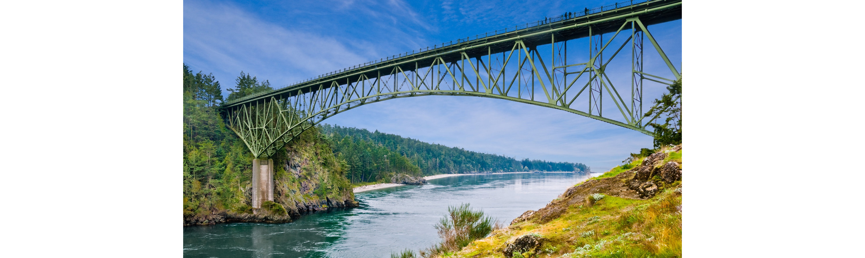 Steel bridge over a river.