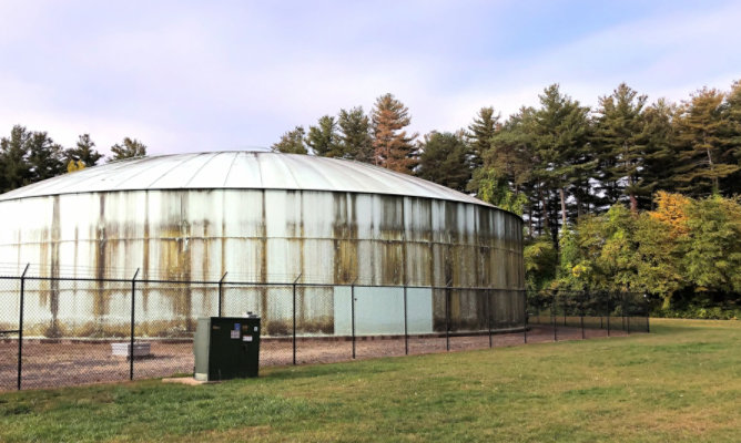 Before photo of water storage tank far away shot