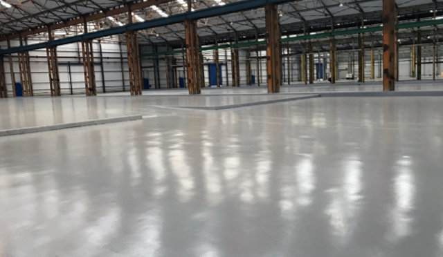 Heavy duty epoxy flooring in an industrial manufacturing facility