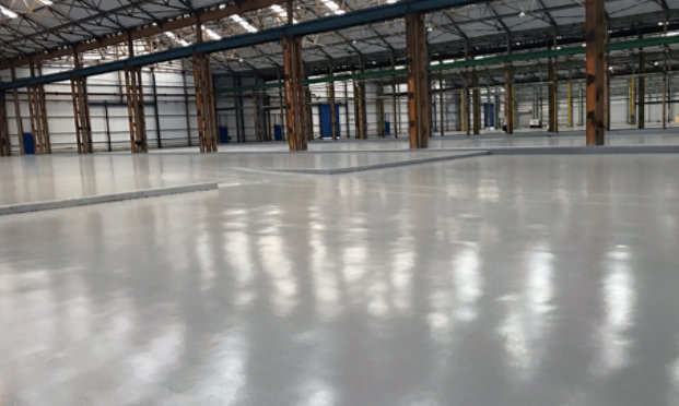 Heavy duty epoxy flooring in an industrial manufacturing facility