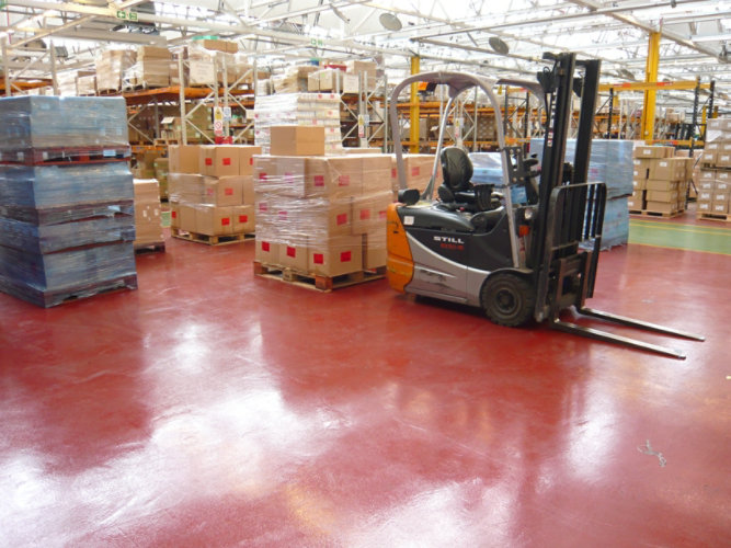 forklift handling cargo in warehouse
