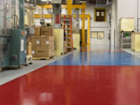 Red and blue electrostatic floor in manufacturing facility