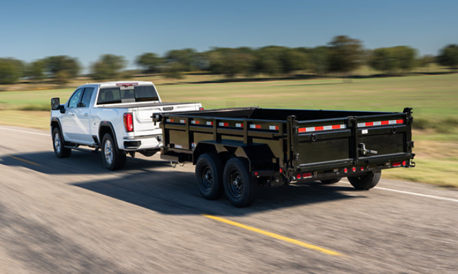 image of pickup truck pulling trailer