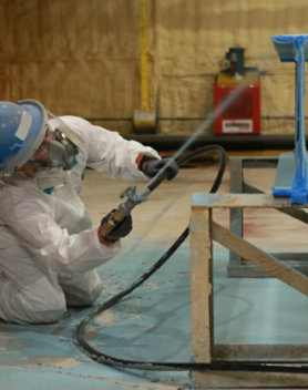 Spraying M90/03 onto a steel beam