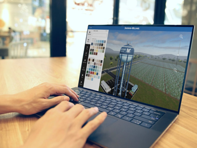 Image of hands typing on computer with water tank color designer tool on the screen