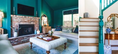 (left) living room with teal walls, a fireplace, neutral furniture (right) wooden staircase with a teal railing and blue decor near it.