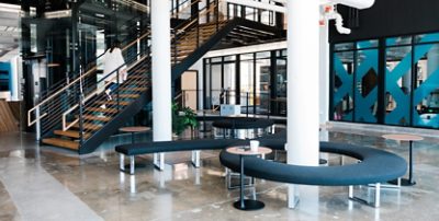 Large open space with benches, tables, and a large staircase.