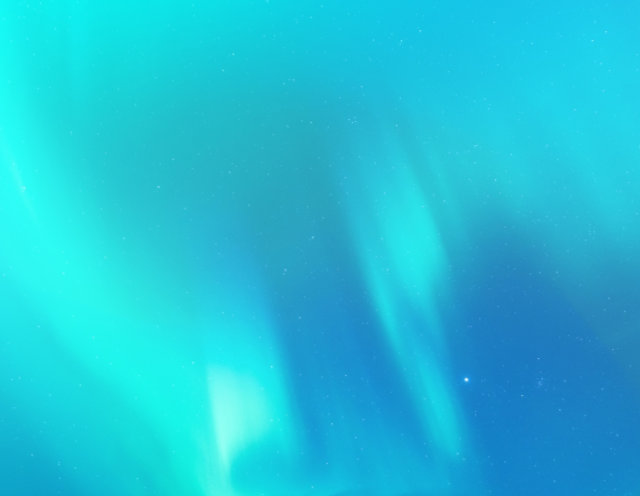 A blue aurora in the night sky