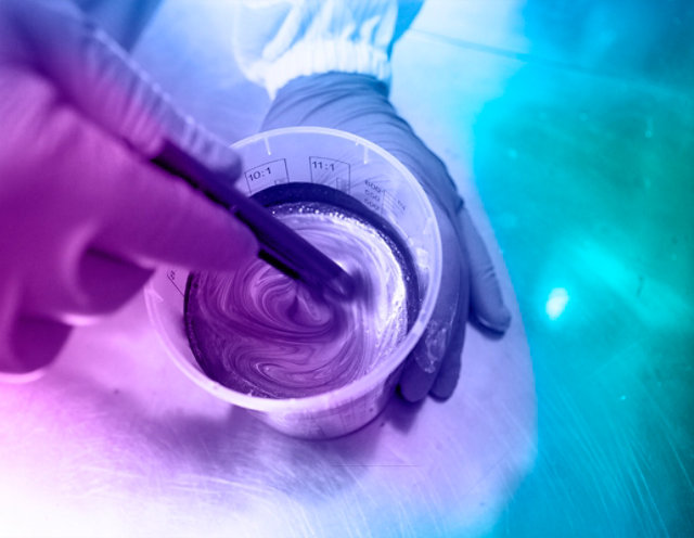 Octoral painter mixing paint