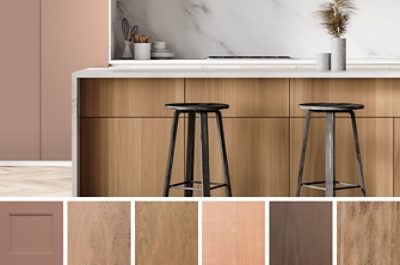 A bar top with black barstools against a white marble wall. Some neutral colored wood panels.