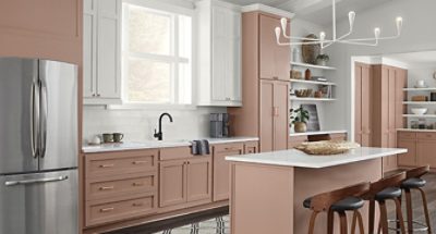 redend point cabinets with some white accents and neutral kitchen decor.
