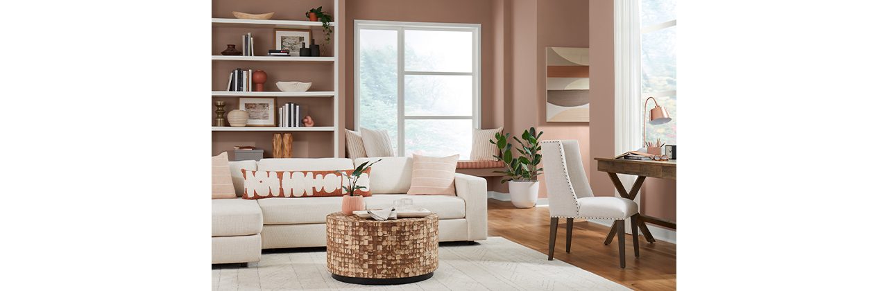 redend point walls with neutral decor and furniture in a living room.