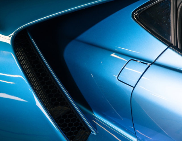 Excellent coat on a blue car