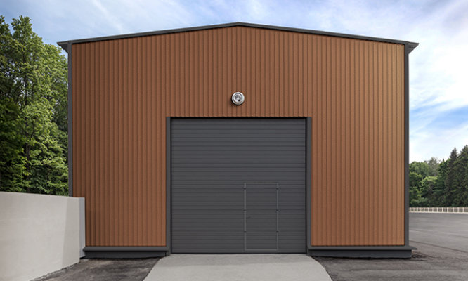 Retouched application image of a metal outbuilding exterior featuring Sherwin-Williams Emulate Metal Hammered pattern panels in the Forge Copper colorway 